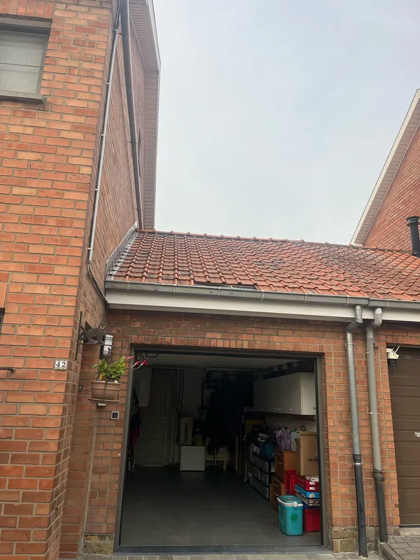 Vernieuwen van pannendak met loden aansluitingen