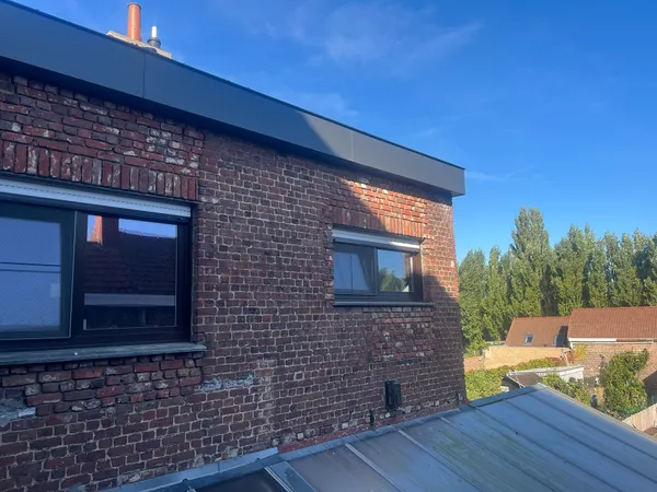 Uitbekleden van bakgoot met volkernpanelen